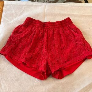 Red lacy shorts with pockets; medium
